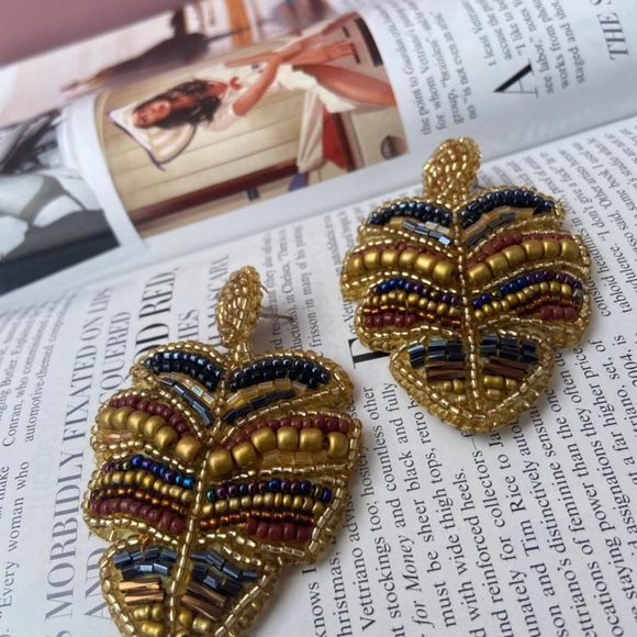 Handmade tendrils with a variety of colors in the shape of a palm leaf - Picture 4 of 4